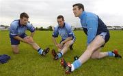 26 July 2004; The Dubs will be relying on the new technology in their adidas Predator Pulse boots to give them the edge over Roscommon, in the next stage of the All-Ireland Football Championship qualifiers on Saturday 31st July at Croke Park. Pictured with the boots during a squad training session ahead of next weekend's game are, from left, Bryan Cullen, Paddy Christie and Ray Cosgrove. Picture credit; Brendan Moran / SPORTSFILE
