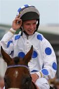 27 July 2004; A delighted Rory Cleary pictured after winning the McDonagh EBF Handicap. Galway Races, Ballybrit, Co. Galway. Picture credit; Matt Browne / SPORTSFILE