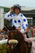 27 July 2004; A delighted Rory Cleary pictured after winning the McDonagh EBF Handicap. Galway Races, Ballybrit, Co. Galway. Picture credit; Matt Browne / SPORTSFILE