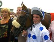 27 July 2004; Rory Cleary pictured with Palace Star and the winning connectios after their victory in the McDonagh EBF Handicap. Galway Races, Ballybrit, Co. Galay. Picture credit; Matt Browne / SPORTSFILE