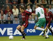 27 July 2004; Kevin Hunt, Bohemians, in action against Argo Arbeiter, FC Levadia Tallinn. UEFA Cup, 1st Qualifying Round, 2nd Leg, Bohemians v FC Levadia Tallinn, Dalymount Park, Dublin. Picture credit; Brian Lawless / SPORTSFILE