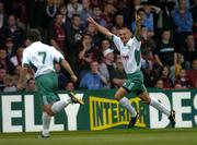 27 July 2004; Vitoldas Depauskas, FC Levadia Tallinn, celebrates with team-mate Tihhon Sisov after scoring a goal for his side, UEFA Cup, 1st Qualifying Round, 2nd Leg, Bohemians v FC Levadia Tallinn, Dalymount Park, Dublin. Picture credit; Brian Lawless / SPORTSFILE