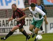 27 July 2004; Tihhon Sisov, FC Levadia Tallinn, in action against Glen Crowe, Bohemians. UEFA Cup, 1st Qualifying Round, 2nd Leg, Bohemians v FC Levadia Tallinn, Dalymount Park, Dublin. Picture credit; Brian Lawless / SPORTSFILE