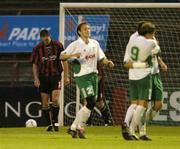 27 July 2004; Vladimir Tselnokov, left, and Aleksandr Dmitrijev, no.9, with Konstantin Nahk, hidden, FC Levadia Tallinn, celebrate after team-mate Marius Dovydenas scored  his sides third goal as Colin Hawkins, Bohemians, looks on. UEFA Cup, 1st Qualifying Round, 2nd Leg, Bohemians v FC Levadia Tallinn, Dalymount Park, Dublin. Picture credit; David Maher / SPORTSFILE