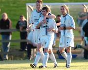 28 July 2004; UCD's Sean Finn (10) celebrates with team-mates Tony McDonnell, left, and Patrick Sullivan after scoring a goal for his side. FAI Cup Replay, UCD v Cork City, Belfield Park, UCD, Dublin. Picture credit; Brian Lawless / SPORTSFILE