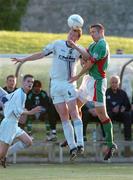 28 July 2004; Tony McDonnell, UCD, in action against Alan Bennett, Cork City. FAI Cup Replay, UCD v Cork City, Belfield Park, UCD, Dublin. Picture credit; Brian Lawless / SPORTSFILE