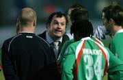 28 July 2004; Cork City manager Pat Dolan speaks to his players after the match. FAI Cup Replay, UCD v Cork City, Belfield Park, UCD, Dublin. Picture credit; Brian Lawless / SPORTSFILE