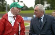 24 July 2004; An Taoiseach Bertie Ahern TD, in conversation with track official and longtime athletics supporter Harry Gorman. AAI Senior Track and Field Championships, Morton Stadium, Santry, Dublin. Picture credit; Brendan Moran / SPORTSFILE