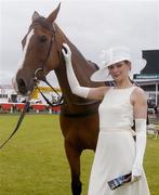 29 July 2004; Model Polly Robinson with Florida Pearl, who  was succesful in the King George VI Chase in 2001. As sponsors of Galway Hurdle Day Guinness added something special to the Galway races earlier today by parading one of Ireland's greatest horses, Florida Pearl, before the start of the days races. Galway Races, Ballybrit, Co. Galway. Picture credit; Damien Eagers / SPORTSFILE