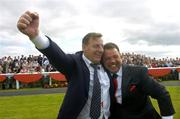 29 July 2004; Winning owner Bernard Gillane, left, celebrates with his friend Eamon Shiel after his horse Cloone River had won the Guinness Galway Hurdle Handicap. Galway Races, Ballybrit, Co. Galway. Picture credit; Damien Eagers / SPORTSFILE