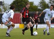 29 July 2004; Darragh Sheridan, Longford Town, in action against Marius Zarn, 15, and Marco Perez, FC Vaduz. UEFA Cup, 1st Qualifying Round, 2nd Leg, Longford Town v FC Vaduz, Flancare Park, Longford. Picture credit; Ray McManus / SPORTSFILE