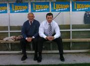 29 July 2004; Newly appointed Dublin City FC manager Roddy Collins with Jim Fitzpatrick, left, sits in the dugout before the game. eircom League, Premier Division, Dublin City v St. Patrick's Athletic, Tolka Park, Dublin. Picture credit; Brian Lawless / SPORTSFILE