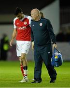 13 September 2013; Killian Brennan, St Patrick’s Athletic, leaves the pitch injured during the first half. FAI Ford Cup Quarter-Final, St Patrick’s Athletic v Shamrock Rovers, Richmond Park, Dublin. Picture credit: David Maher / SPORTSFILE
