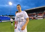 13 September 2013; Graham Gartland, Shelbourne, wears a t-shirt in support of Drogheda United's Gary O'Neill. FAI Ford Cup Quarter-Final, Shelbourne v Dundalk, Tolka Park, Dublin. Picture credit: Brian Lawless / SPORTSFILE