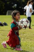 14 September 2013; Shaboo Kunnahar, age 2, from Carlow Town, Co. Carlow, pictured at the All-Stars challenge celebrity match at the Phoenix Park, Dublin. The match was part of a programme of events that formed part of the annual Tesco Mobile Sport Against Racism Ireland, SARI, Soccerfest. The All-Stars challenge match saw sports broadcaster Eoin McDevitt going head to head in a battle of soccer tactics with Ireland's U21 international manager Noel King. The match was refereed by former Arsenal and Ireland player John Devine. This year’s tournament was the biggest ever as 56 Men's, Women's and Under-13 teams tackled racism, challenged discrimination and promoted dignity and respect for all. Garda & Camogie Sports Grounds, Phoenix Park, Dublin.  Picture credit: David Maher / SPORTSFILE