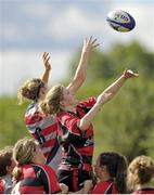 14 September 2013; Amy Martin, Tullamore, wins possession for her side in a line-out ahead of Megan Quinn, Tullamore, during the North East Underage Girls Blitz. Portarlington, Co. Laois. Picture credit: Pat Murphy / SPORTSFILE