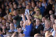 14 September 2013; Clare captain Paul Flanagan lifts the trophy after the game. Bord Gáis Energy GAA Hurling Under 21 All-Ireland 'A' Championship Final, Antrim v Clare, Semple Stadium, Thurles, Co. Tipperary. Picture credit: Ray McManus / SPORTSFILE