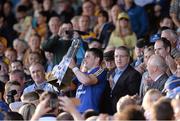 14 September 2013; Clare captain Paul Flanagan lifts the trophy after the game. Bord Gáis Energy GAA Hurling Under 21 All-Ireland 'A' Championship Final, Antrim v Clare, Semple Stadium, Thurles, Co. Tipperary. Picture credit: Ray McManus / SPORTSFILE