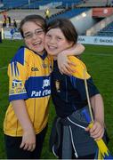 14 September 2013; Clare supporters Sinead O'Connor, aged 9, and her friend Oriana O'Shea, aged 9, both from Ennis, Co. Clare, in a jovial mood following the game. Bord Gáis Energy GAA Hurling Under 21 All-Ireland 'A' Championship Final, Antrim v Clare, Semple Stadium, Thurles, Co. Tipperary. Picture credit: Ray McManus / SPORTSFILE
