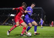 29 March 2024; Charlie Wiggett of Sligo Rovers in action against Padraig Amond of Waterford during the SSE Airtricity Men's Premier Division match between Waterford and Sligo Rovers at the Regional Sports Centre in Waterford. Photo by Michael P Ryan/Sportsfile