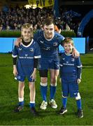 29 March 2024; Leinster captain Luke McGrath with match day mascots Liam Alejandro Shirley and Ciarán Kirrane before the United Rugby Championship match between Leinster and Vodacom Bulls at the RDS Arena in Dublin. Photo by Harry Murphy/Sportsfile