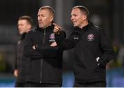 29 March 2024; Bohemians first team coach Derek Pender, right, and manager Alan Reynolds during the SSE Airtricity Men's Premier Division match between Shamrock Rovers and Bohemians at Tallaght Stadium in Dublin. Photo by Stephen McCarthy/Sportsfile