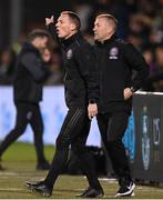 29 March 2024; Bohemians first team coach Derek Pender and manager Alan Reynolds, right, during the SSE Airtricity Men's Premier Division match between Shamrock Rovers and Bohemians at Tallaght Stadium in Dublin. Photo by Stephen McCarthy/Sportsfile