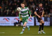 29 March 2024; Darragh Nugent of Shamrock Rovers in action against Jordan Flores of Bohemians during the SSE Airtricity Men's Premier Division match between Shamrock Rovers and Bohemians at Tallaght Stadium in Dublin. Photo by Stephen McCarthy/Sportsfile