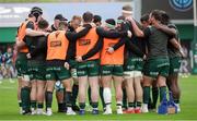 30 March 2024; Connacht players in a huddle before the United Rugby Championship match between Benetton and Connacht at Stadio Monigo in Treviso, Italy. Photo by Roberto Bregani/Sportsfile