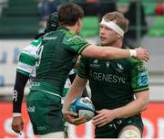 30 March 2024; Niall Murray, right, of Connacht celebrates with teammate Michael McDonald after scoring his side's first try during the United Rugby Championship match between Benetton and Connacht at Stadio Monigo in Treviso, Italy. Photo by Roberto Bregani/Sportsfile
