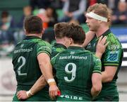 30 March 2024; Niall Murray, right, of Connacht celebrates with teammates after scoring his side's first try during the United Rugby Championship match between Benetton and Connacht at Stadio Monigo in Treviso, Italy. Photo by Roberto Bregani/Sportsfile
