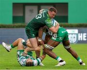 30 March 2024; Shayne Bolton of Connacht is tackled by Jacob Umaga and Alessandro Izekor of Benetton during the United Rugby Championship match between Benetton and Connacht at Stadio Monigo in Treviso, Italy. Photo by Roberto Bregani/Sportsfile