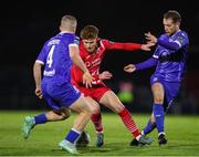 29 March 2024; Connor Malley of Sligo Rovers in action against Niall O'Keeffe, left, and Rowan McDonald of Waterford during the SSE Airtricity Men's Premier Division match between Waterford and Sligo Rovers at the Regional Sports Centre in Waterford. Photo by Michael P Ryan/Sportsfile