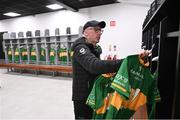 30 March 2024; Leitrim kitman Thomas Mimna hangs jerseys in the dressing room before the Allianz Football League Division 4 final match between Laois and Leitrim at Croke Park in Dublin. Photo by Ramsey Cardy/Sportsfile