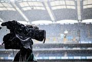 30 March 2024; Rain falls on a broadcast camera before the Allianz Football League Division 4 final match between Laois and Leitrim at Croke Park in Dublin. Photo by Ramsey Cardy/Sportsfile