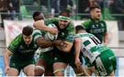 30 March 2024; Shamus Hurley-Langton of Connacht is tackled by Bautista Bernasconi of Benetton during the United Rugby Championship match between Benetton and Connacht at Stadio Monigo in Treviso, Italy. Photo by Roberto Bregani/Sportsfile