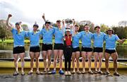 30 March 2024; The UCD Senior Men's team from left, Dach Murray, Eoin McGrath, Ross Mason, Paul Flood, cox Rhian Nelson, Ciaran Conway, Andrew Carroll, Sam Daly and David Crooks, with the Gannon Cup, after winning the annual Colours Boat Race between UCD and Trinity College on the River Liffey in Dublin. Photo by Sam Barnes/Sportsfile