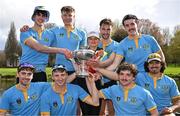 30 March 2024; The UCD Senior Men's team, back row from left, Ross Mason, Paul Flood, cox Rhian Nelson, Ciaran Conway, Andrew Carroll, with front row, from left, Eoin McGrath, Dach Murray, Sam Daly and David Crooks, with the Gannon Cup, after winning the annual Colours Boat Race between UCD and Trinity College on the River Liffey in Dublin. Photo by Sam Barnes/Sportsfile