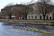 30 March 2024; The UCD Senior Men's team, from front to back, David Crooks, Sam Daly, Andrew Carroll, Ciaran Conway, Paul Flood, Ross Mason, Eoin McGrath, Dach Murray and Cox Rhian Nelson, on their way to winning the Gannon Cup during the annual Colours Boat Race between UCD and Trinity College on the River Liffey in Dublin. Photo by Sam Barnes/Sportsfile