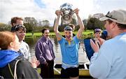 30 March 2024; Dach Murray of UCD Senior Men celebrates with the Gannon Cup after the annual Colours Boat Race between UCD and Trinity College on the River Liffey in Dublin. Photo by Sam Barnes/Sportsfile