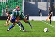 30 March 2024; Joy Ralph of Shamrock Rovers is tackled by Grace McInerney of Treaty United during the SSE Airtricity Women's Premier Division match between Shamrock Rovers and Treaty United at Tallaght Stadium in Dublin. Photo by Tyler Miller/Sportsfile