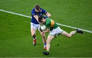 30 March 2024; Tom Prior of Leitrim in action against Mark Timmons of Laois during the Allianz Football League Division 4 final match between Laois and Leitrim at Croke Park in Dublin. Photo by Ramsey Cardy/Sportsfile