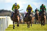 30 March 2024; Effernock Fizz, left, with Carl Millar up, on their way to winning the RYBO Handicap Hurdle on day one of the Fairyhouse Easter Festival at Fairyhouse Racecourse in Ratoath, Meath. Photo by Seb Daly/Sportsfile