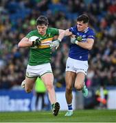 30 March 2024; Pearce Dolan of Leitrim in action against Kevin Swayne of Laois during the Allianz Football League Division 4 final match between Laois and Leitrim at Croke Park in Dublin. Photo by Ramsey Cardy/Sportsfile