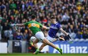 30 March 2024; Evan O'Carroll of Laois has a shot on goal during the Allianz Football League Division 4 final match between Laois and Leitrim at Croke Park in Dublin. Photo by Shauna Clinton/Sportsfile
