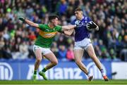 30 March 2024; Evan O'Carroll of Laois in action against Mark Diffley of Leitrim during the Allianz Football League Division 4 final match between Laois and Leitrim at Croke Park in Dublin. Photo by Shauna Clinton/Sportsfile