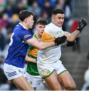 30 March 2024; Leitrim goalkeeper Nevin O'Donnell in action against Mark Barry of Laois during the Allianz Football League Division 4 final match between Laois and Leitrim at Croke Park in Dublin. Photo by Ramsey Cardy/Sportsfile