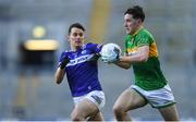 30 March 2024; Barry McNulty of Leitrim in action against Brian Byrne of Laois during the Allianz Football League Division 4 final match between Laois and Leitrim at Croke Park in Dublin. Photo by Shauna Clinton/Sportsfile