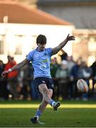 30 March 2024; James Tarrant of UCD kicks a penalty during the annual Men’s Rugby Colours match between Dublin University and UCD at College Park in Trinity College, Dublin. Photo by Sam Barnes/Sportsfile