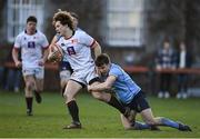 30 March 2024; Louis McDonough of Dublin University is tackled by Tim Corkery of UCD during the annual Men’s Rugby Colours match between Dublin University and UCD at College Park in Trinity College, Dublin. Photo by Sam Barnes/Sportsfile